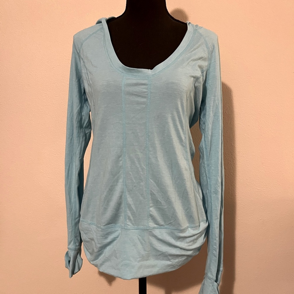 Zella size M light blue long sleeved hooded yoga pullover.